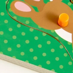 Knoppuslespil I Trae