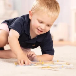 Knoppuslespil I Trae